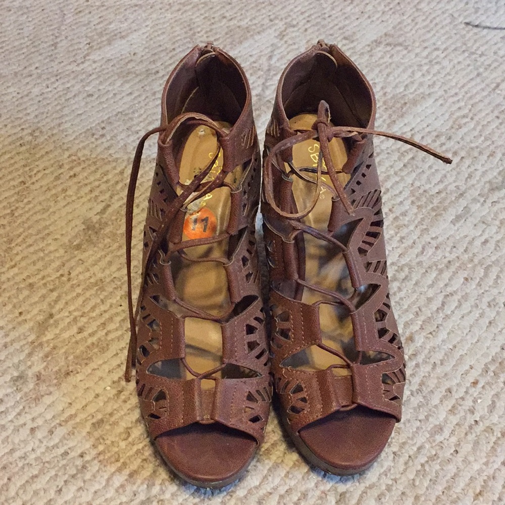 Brown tie up wedges